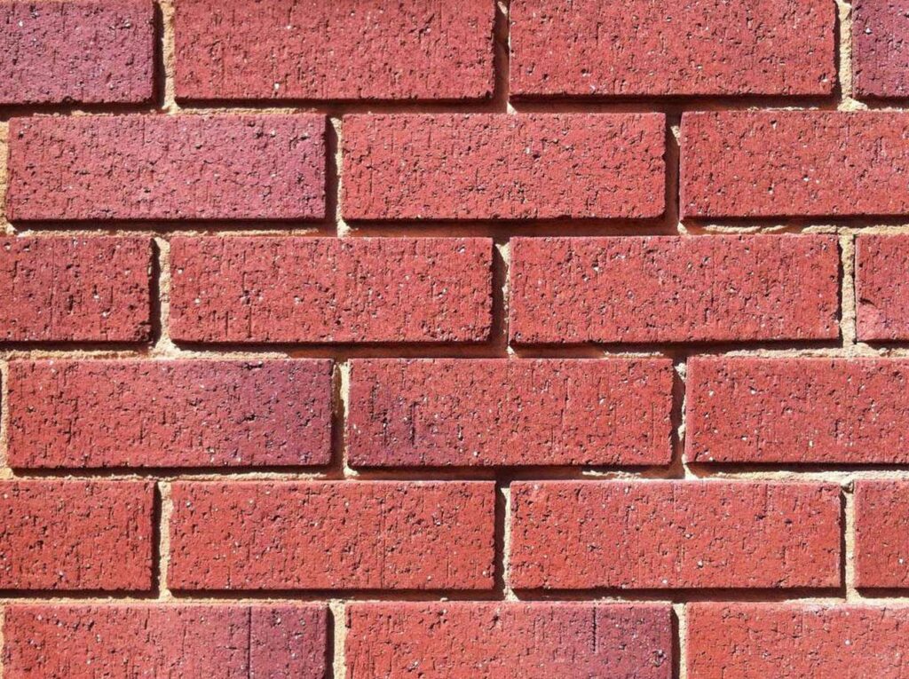 A sample of an old wall BEFORE Brick Repointing